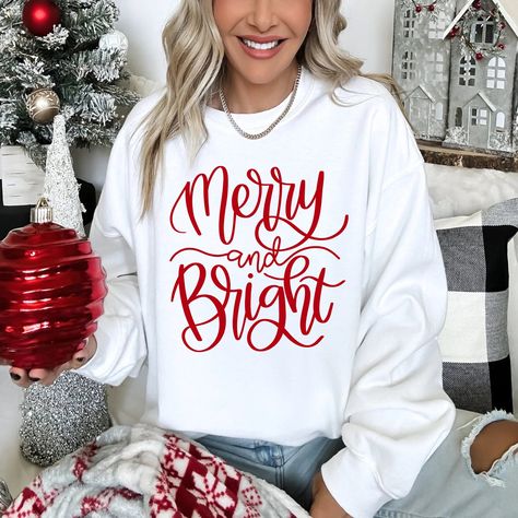 Merry & Bright Christmas Adult Christmas Shirt Embrace the holiday season with this festive Christmas shirt, the perfect addition to your wardrobe! Show off your Christmas spirit while staying stylish. Available in sizes small-3X, you can enjoy a cozy fit in two different styles. Let the joyful holiday vibes take over and get your hands on this must-have Christmas shirt today! Final Sale no returns on apparel Holiday Tshirts Ideas, Cute Christmas Shirts Vinyl, Christmas Cricut Shirts, Christmas Shirt Ideas Vinyl, Christmas Tshirt Ideas, Christmas Shirt Ideas, Christmas Graphic Tees, Holiday Shirt Ideas, Diy Christmas Shirts