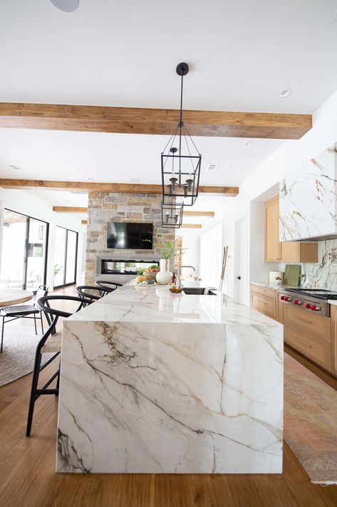 Waterfall Island With Cooktop, Two Tone Island Countertop, Half Waterfall Kitchen Island, Statement Island Countertop, Porcelain Waterfall Island, Quartz Island Waterfall, Waterfall Granite Island, Light Stone Countertops, Quartz Waterfall Countertop