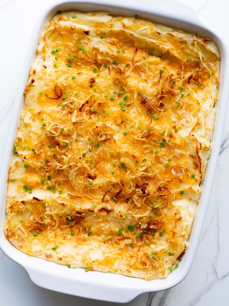 Baked cheesy mashed potatoes with crispy shallots on top! #mashedpotatoes #potatoes #sidedish Baked Cheesy Mashed Potatoes, Cheesy Baked Mashed Potatoes, Mashed Potato Recipe, Baked Mashed Potatoes, Best Baked Potato, Cheese Mashed Potatoes, Mashed Potato Casserole, Parmesan Cheese Potatoes, Mashed Potatoes Recipe