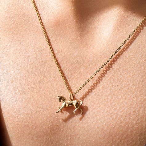 "Delicate Gold Rings, and Necklaces via Free Fast Delivery The Pendant Necklace Details ✪ 14k Solid Yellow Gold (also in 10, 18K) ✪ Gold Colour Options; Yellow Gold, White Gold, Rose Gold ✪ Pendant, 15x10 mm ✪ Thickness, 3.20 mm ✪ It can be used with up to 3 mm chains. If you are to use it with a thicker chain, please let us know before you make the purchase. ✪ Ready to Ship in 7 Business Days 🛠 Norm Jewels' pieces are handcrafted by 15-30 years of experienced artisans and made to order. 🛠 Fre Gold Everyday Necklace, Everyday Necklace Gold, Everyday Pendant, Delicate Gold Ring, Gold Leaf Rings, Horse Pendant, Gold Horse, Tiny Charm, Horses Pendant