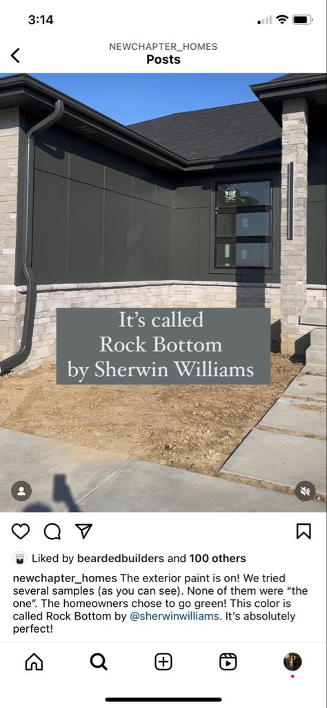 Dark Stucco Exterior House Modern, Painted Rock On House Exterior, Rock Bottom Sherwin Williams Cabinets, Sw Rock Bottom Exterior, Sherwin Williams Rock Bottom Exterior, Sw Rock Bottom Paint, Rock Bottom Sherwin Williams Exterior, Sherwin Williams Rock Bottom Paint, Black House Landscaping