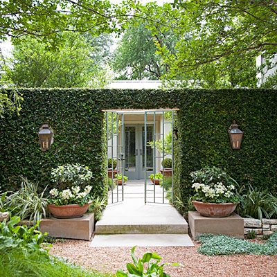 I like that the iron gate opens to a straight view of the fiberglass front door of the same color plus the surrounding rustic but very neat garden. Neat Garden, Front Courtyard, Courtyard Design, Desain Lanskap, Beautiful Outdoor Spaces, Have Inspiration, Iron Gate, Gorgeous Gardens, Garden Fence