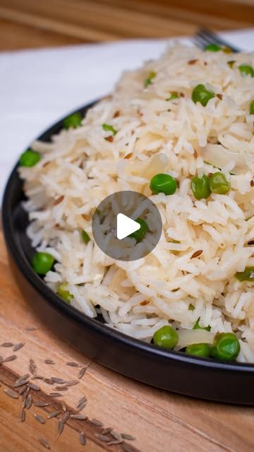 Sheena | Indian(ish) Recipes on Instagram: "MOM’S 10 MIN FLUFFY BASMATI RICE 🍚 is the most flavorful, fluffiest rice you’ll ever have.  And it’s so quick to make! Perfect for pairing with curries, grilled veggies, or just savoring on its own. Serves 4.

INGREDIENTS
- 1 cup basmati rice
- 1/2 cup peas
- 1/2 large yellow onion, thinly sliced
- 1/4 jalapeno, finely chopped
- 1/2 tsp lemon juice
- 1/2 tsp salt
- 1 tsp cumin seeds
- 2 tbsp avocado oil
- 2 cups warm water

DIRECTIONS
1. Prep the Rice: Rinse the rice under cold water until the water runs clear. Then, soak it in cold water for 10 minutes and drain.
2. Cook the Spices and Vegetables: Heat 2 tablespoons of avocado oil in a large, shallow pan over medium-high heat. Add 1 teaspoon of cumin seeds and let them fry until they begin to w Instagram Mom, Rice And Peas, Cumin Seeds, Grilled Veggies, Joy Of Cooking, Recipe For Mom, Basmati Rice, Side Recipes, Indian Recipes