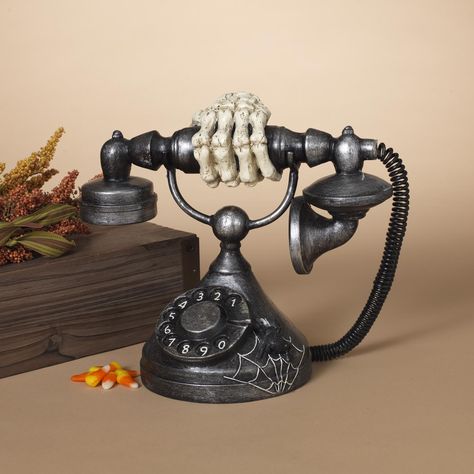 Make Halloween Spooktacular this year with this resin antique telephone with skeleton hand and sound sensor. Skeletal Hand, Halloween Antiques, Rotary Telephone, Antique Telephone, Halloween Spooktacular, Halloween Table Decorations, Gerson, Halloween Table, Skeleton Hand