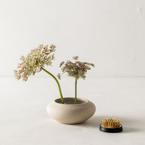 This small metal Kenzan, also known as a flower frog, is an essential tool used in the Japanese art of flower arranging, commonly referred to as Ikebana. The Kenzan supports thoughtfully placed stems in a vessel to showcase the natural movement and shape of each flower and foliage. Pairs beautifully with our Ikebana Vase No. 1 in both our Stoneware or Raw Stoneware finish. Brand: Convivial Made Of: Metal Sustainability Practices: Recyclable, durable, made from renewable resources, locally made. Japanese Tools, Ikebana Vase, Flower Arrangement Designs, Ikebana Arrangements, Ikebana Flower Arrangement, Ikebana Vases, Natural Movement, Flower Holder, Flower Frog