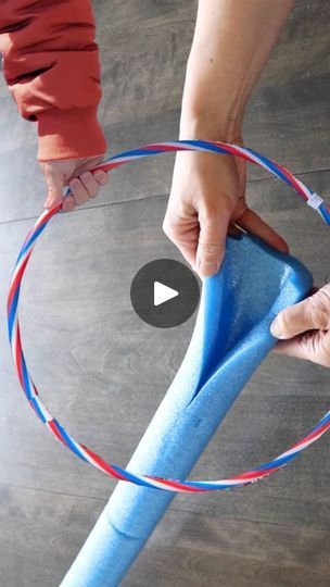 Dollar Store Pool Noodle Hula Hoop Hack | Stick a hula hoop into a pool noodle for this brilliant front porch idea! | By DIY with Hometalk | Grab a pool noodle and a hula
hoop for this front porch decoration. I'm going to use a
utility knife to slice the pool noodle vertically. This is
going to allow me to open up the pool noodle and slip it
around the hula hoop. I'm going to need about one and a
half noodles to cover this hula hoop. Now I'm going to grab
some duct tape and just secure the pieces together. Since this
is bright blue, I don't want it to show through my greenery. So
I'm going to grab some burlap ribbon and just wrap it around
the pool noodle. I can use a bit of hot glue as I go but
this should hold up pretty well. Now that this is all
covered in burlap, I've got these little Pool Noodle Tunnel Diy, Christmas Wreaths Diy Pool Noodle, Things To Make With Pool Noodles, Diy With Pool Noodles, Pool Noodle Crafts Decor, Pool Noodle Lollipop Diy, Pool Noodles Crafts, Pool Noodle Decorations, Christmas Pool Noodle Ideas