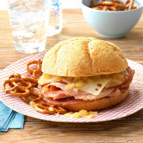 Hot Pineapple Ham Sandwiches Recipe -Your trusty slow cooker lets you make these warm, gooey sandwiches without heating up the house on a hot day. The mustard and brown sugar give them a richness everybody loves. —Nancy Foust, Stoneboro, Pennsylvania Ham Sandwich Recipes, Sweet Meatballs, Buffalo Meatballs, 70s Food, Cubano Sandwich, Pineapple Ham, Meatball Sliders, Ham Sandwich, Ham Sandwiches