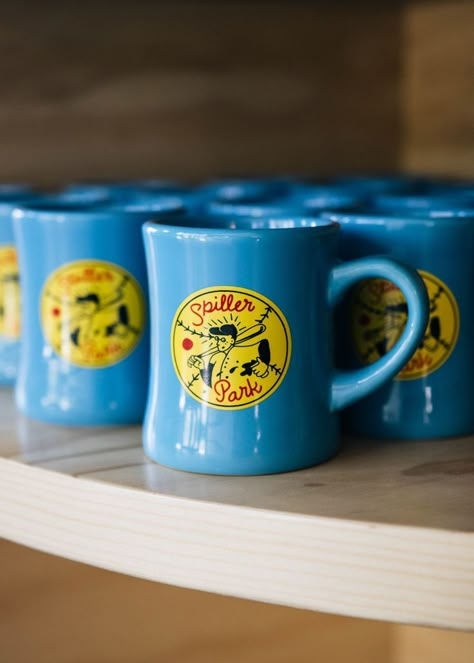 The happiest mug you ever saw! Spiller Park Coffee and Created Co. ceramic blue diner mugs. Cafe Merch, Scout Aesthetic, Cheese Poster, Three Pines, Diner Mug, Alix Earle, Local Pizza, Brand Collateral, Vintage Diner