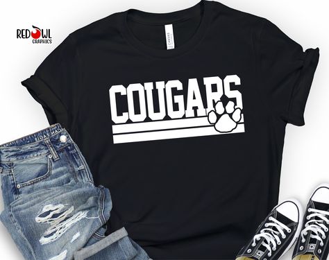 Personalized Cougar School Spirit T-Shirt Crewneck, Hoodie Hooded Sweatshirt Football, Baseball, Basketball, Softball, Track, Volleyball, Cross Country, Cheer, Wrestling Not all colors are available in all sizes and styles.  Please check the color and size charts in photos. We do our best to accurately represent shirt colors by using actual photos but do understand that all monitors will display differently. Please contact us prior to purchase with any questions on sizing or colors. Your purchas Cougars Spirit Shirts, Elementary School Sweatshirts Designs, Cougar Shirt Design, Middle School Cheer Shirts, Retro School Spirit Shirts, Elementary Spirit Shirts, Team Sport Shirt Design, High School Sweatshirts, School Sweatshirts Designs