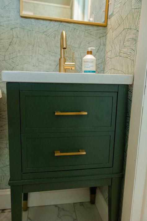 Small Green Bathroom Cabinet with gold hardware. Small Cottage Bathroom, Small Green Bathroom, Green Cabinet, Cottage Renovation, Cottage Bathroom, Cottage Charm, Wallpaper White, White Subway Tile, Green Cabinets