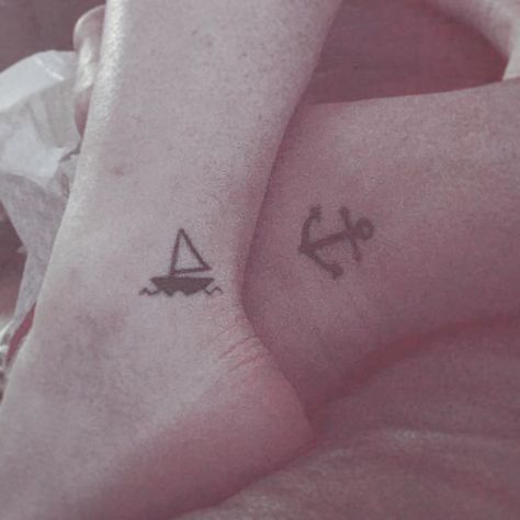 Matching tattoos, couple tattoo.sailboat and anchor Boat And Anchor Couple Tattoo, Sailboat And Anchor Tattoo, Matching Anchor Tattoos, Tattoo Sailboat, His And Hers Tattoos, Tattoos Anchor, Married Couple Tattoos, Pair Tattoos, Navy Tattoos