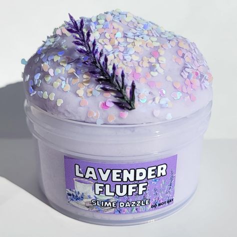 PRICES MAY VARY. Relaxing Cloud Slime Lavender Scented Great relaxing sensory slime for ages made in USA with non toxic ingredients CPC tested and ceritfied Scented with therapiutic grade lavender oil Lavender Fluff Relaxing Slime Lavender Scented TEXTURE: Cloud super drizzly easy to handle and relaxing to play with slime SCENT: Dreamy Lavender ADD-INS: Random Charm Each slime comes with 1 Activator Pen Spray FIXES STICKY SLIME 👍 1 per order If you need more activator you can purchase more at m Cool Slimes, Fluff Slime, Sensory Slime, Cute Slime, Cheap Slime, Slime Aesthetic, Sticky Slime, Pretty Slime, Playing With Slime