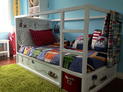 Cute Ikea Kura Bed. Not a fan of the pirate theme but I do like flipping this bed for littles, then being able to turn it into a bunk bed later. So many possibilities. Ikea Under Bed Storage, Pirate Bedroom Decor, Ikea Kids Bed, Ikea Loft, Kura Bed Hack, Ikea Bunk Bed, Space Saving Bunk Bed, Ikea Loft Bed, Kids Bed Canopy