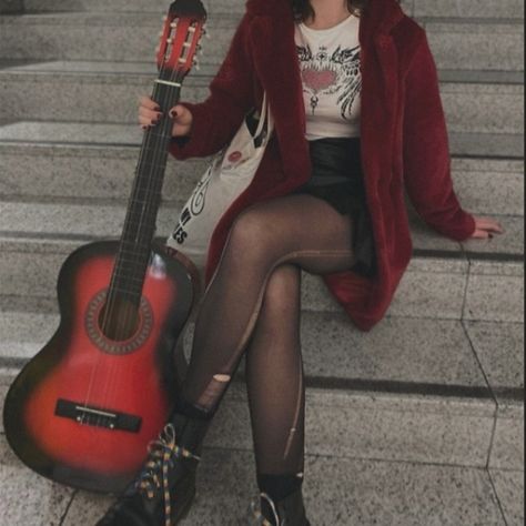 Girl sitting on stairs while holding a red guitar. She's waring a red fur coat with a black leather skirt and ripped tights. Rockstar Outfits Aesthetic, 90s Pop Punk Aesthetic, Red Fits Aesthetic, Grunge Rockstar Aesthetic, Rock Aesthetic Outfits, Rockstar Aesthetic Outfits, Rock Star Outfit, Rockstar Aesthetic, Rocker Girl