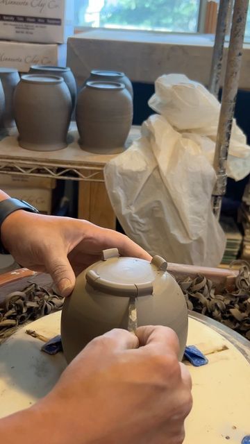 Paula Clegg on Instagram: "I’m working on my Cauldron Mug design for my October preorders! In the past, I have attached little pieces of clay to make the feet, but that is very time consuming, so to help me save time and you money, I am working in a new design where I cut away the clay after trimming to give them a similar raised look. I still need to soften the edges, but what do ya’ll think of this design so far?! Also, who’s excited about Cauldron Mugs making a come back?! I will share some Ceramic Cauldron Pottery, Pottery Cauldron, Cauldron Ceramic, Ceramic Cauldron, Cauldron Mug, How To Make Ceramic, Clay Techniques, Ceramic Inspiration, Pottery Videos