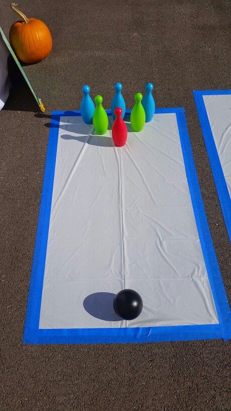 Diy bowling alley party game Outdoor Bowling Alley Diy, Bowling Diy, Carnival Bowling Game, Bowling Activities For Kids, Homemade Bowling Game, Diy Bowling Game, Diy Bowling Alley, Bowling Games For Kids, Bowling Alley Party