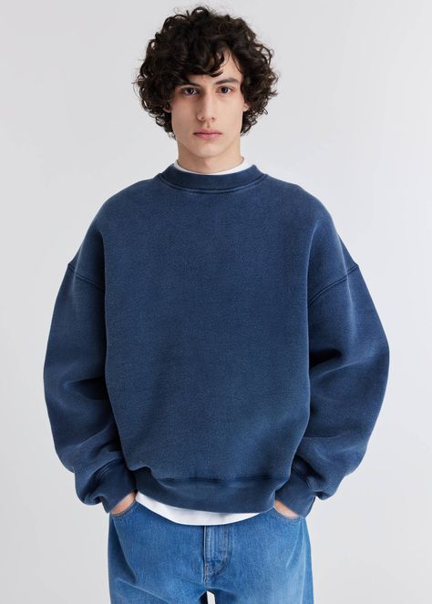 Cut from organic cotton, the oversized Typo sweatshirt is crafted using an old-dye technique to achieve a vintage look. Embroidered letters across the back spell out ‘Axel’. Mens Outfits Sweatshirt, Sweat Outfits Men, Navy Blue Sweatshirt Outfit Men, Oversized Sweatshirt Outfit Men, Mens Crewneck Outfit, Crewneck Sweatshirt Outfit Men, Crew Neck Sweatshirt Outfit Men, Granola Boy Aesthetic Outfits, Sweats Outfit Men