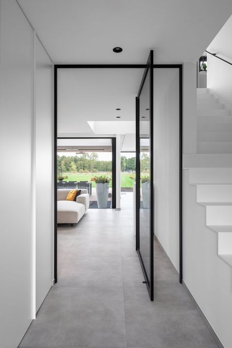 Beautiful glass pivot door made from black anodised aluminium with invisible Stealthpivot pivot hinge technology. This door is manufactured in 2019 by Belgian brand ANYWAYdoors. Pivot Door, Doors Interior Modern, House Extension Design, Luxury Living Room Design, Glass Doors Interior, Interiors Dream, Pivot Doors, Corner House, House Stairs