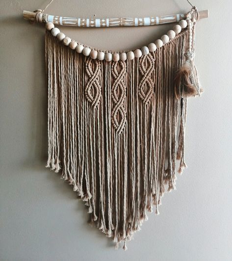 ♡ Decorate the walls of your home with ethnic macrame details ♡ Macrame wall decor measuring 20 x 25 inches adds a distinct elegance to your home for bohemian and rustic touches. With its large wooden beads and a feather detailed tassel, this wall decor will be quite assertive in your homes. There may be 1-2 cm difference as each pattern is re-knotted for you. If you want to see more of my macrame designs (vests, bags, accessories, etc.) you can check out my page♡ For love bohemian spirit ♡ Wall Decor Macrame, Macrame Designs, Beaded Macrame, Macrame Wall Decor, Large Macrame Wall Hanging, Large Macrame, Macrame Decor, Autumn Coffee, Macrame Design