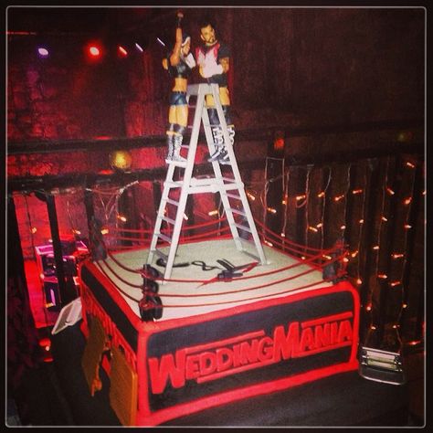 Weddingmania cake. So happy with this, it couldn't have been more perfect for us!! Wrestling wedding cake Wrestling Wedding, Wwe Wedding, Heavy Metal Wedding, Wwe Cake, Wwe Birthday Party, Lane Cake, Wwe Birthday, Crazy Wedding Cakes, Funny Wedding Cakes