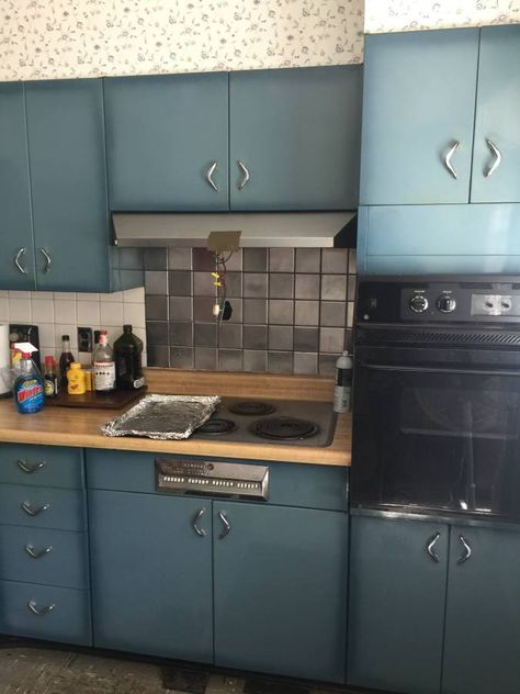 What a lovely color — burnt blue, I’ll call it — in these vintage Youngstown steel kitchen cabinets for sale on craigslist in metro St. Louis. I don’t think we’ve ever seen this color in the wild. It’s makin’ me feel bicentennial chic. Thanks to ready Wendy for the tip, and to seller K, who … Metal Kitchen Cabinets Makeover, Vintage Kitchen Cabinets 1950s, Vintage Metal Kitchen Cabinets, 1950s Kitchen Cabinets, Metal Kitchen Cabinets, Vintage Kitchen Cabinets, Steel Kitchen Cabinets, Kitchen Cabinets For Sale, Kitchen Cabinet Trends