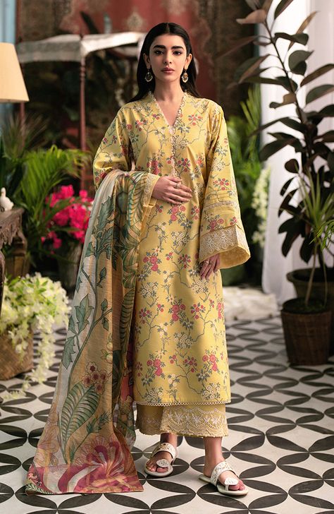 This outfit is not only a visual delight but also a practical choice for the warmer months. The screen-printing technique on the shirt ensures a seamless blend of artistry and comfort, allowing you to breeze through sun-soaked afternoons with grace and ease. To enhance its allure, delicate cream embroidery graces the design, while a printed monar dupatta paired with solid trousers completes the look. Screen Printed Shirt, Lawn Design, Unstitched Dress Material, Summer Lawn, Printed Dupatta, Embroidered Sleeves, Front Lawn, Simple Pakistani Dresses, Screen Printing Shirts