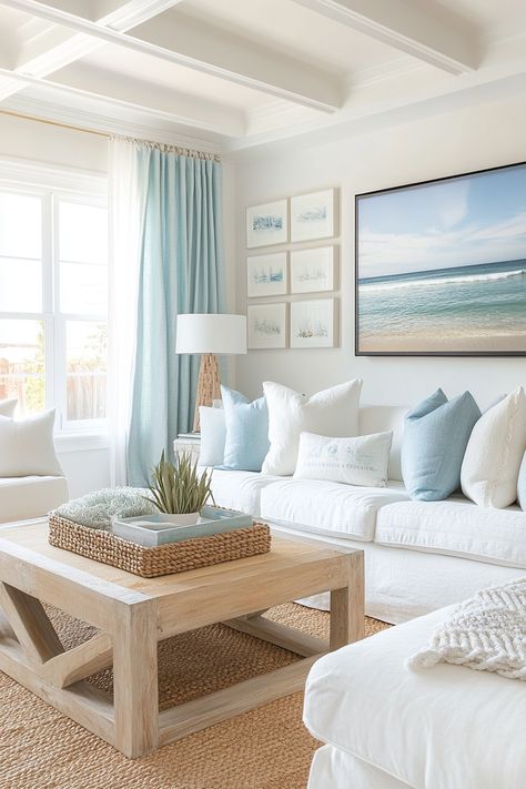 Transform your home with this serene coastal living room decor. Featuring soft blues and natural textures, it brings the calm of the seaside into your space. Perfect for achieving a tranquil and stylish look. #livingroomdecor #coastalstyle #homedecor 🌊 Sophisticated Coastal Living Room, Blue And White Living Room Apartment, Coastal Living Room Area Rugs, Coastal Themed Living Room, Nautical Home Decor Coastal Style, Classy Beach Decor, Colorful Beach House Interior, Coastal Design Living Room, Blue Apartment Aesthetic Living Room