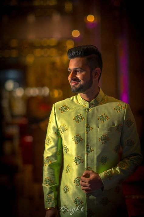 Beautiful pista green sherwani for the groom-to-be. See more on wedmegood.com #wedmegood #indianwedding #groom #outfits #outfitideas #floral #green #groomwear Groom Stills, Haldi Groom, Groom Haldi, Haldi Shoot, Green Sherwani, Haldi Photoshoot, Bride Groom Photoshoot, Best Indian Wedding Dresses, Indian Bride Photography Poses