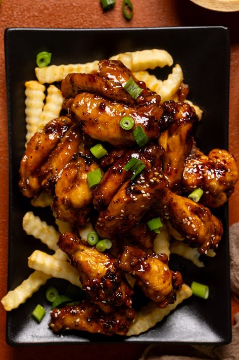 Try our Air Fryer Honey Garlic Chicken Wings—made with sweet raw honey + loaded with fresh garlic, they're irresistibly crispy, sticky, and utterly delicious, perfect for snacking, game days, appetizers, or side dishes. They're a Air Fryer Honey Garlic Chicken, Honey Garlic Wings, Honey Chicken Wings, Honey Garlic Chicken Wings, Garlic Wings, Garlic Chicken Wings, Crispy Chicken Wings, Honey Garlic Sauce, Fried Chicken Wings