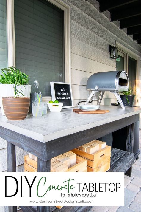 DIY Concrete Tabletop | ©GarrisonStreetDesignStudio | DIY | Concrete | Tabletop | From a hollow core door | Table Top | Hollow Core Door | Countertop | Outdoor | Outdoor Buffet Table | Outdoor Cooking | Pizza Oven | Roccbox | Dining | Skim Coat | Feather Finish | Cement | Concrete DIY | Concrete Furniture | Cement Table | Concrete Table | DIY Table Top | DIY Tabletop | Upcycle | How to make | Tutorial | With a hollow core door | Hollow core door table top | Cheap | Affordable | Easy Buffet Table Outdoor, Diy Table Top Ideas, Cheap Diy Table, Table Top Ideas, Outdoor Buffet Tables, Hollow Core Door, Thrift Store Furniture Makeover Diy, Pizza Oven Outdoor Diy, Outdoor Buffet