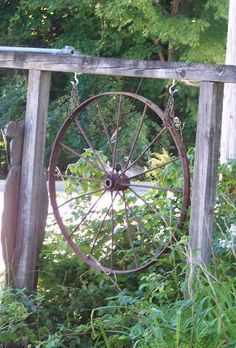 Sheepscot River Primitives - We found this old metal wagon wheel at a local antique store and thought it would be great to hang from the wood frame that use to hold my business sign many years ago. The metal wheel will hold up to the winter snows better than a wooden wheel. Metal Wagon Wheel Ideas Outdoor, Wagon Wheel Fence Ideas, Wagon Wheel Mailbox Ideas, Old Wagon Wheel Ideas Yards, Metal Wheel Ideas, Old Wheel Ideas, Old Wagon Wheel Ideas, Metal Wagon Wheel Ideas, Wagon Wheel Decor Outdoor