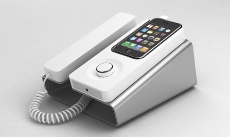 Desk Phone Dock: Charges and syncs your iPhone and functions as a speakerphone. Brand new yet so old school. Phone Dock, Iphone Dock, Iphone Gadgets, Future Gadgets, Phone Speaker, Gadgets And Gizmos, Desk Phone, Cool Tech, Cool Technology