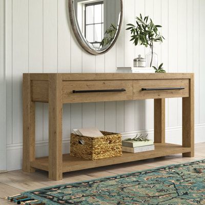 This console table adds the finishing touch to your living room or hallway with extra storage and a classic look. Made from pale oak solid and engineered wood, it features a rectangular top and a four-legged base. The table includes two drawers with dovetail joinery and ball-bearing glides, plus a spacious lower shelf for accent storage baskets or as a display/rack for your favorite shoes. We love that the black metal bar pull adds a little industrial character. | Birch Lane™ Laroche 60" Console Table 30.0 H x 60.0 W x 18.0 D in brownWood in Tan | 30" H X 60" W X 18" D | Wayfair Pale Oak, Table Console, Cord Management, Wood Console Table, Entry Table, Table Wood, Low Shelves, Wood Console, Table Sizes