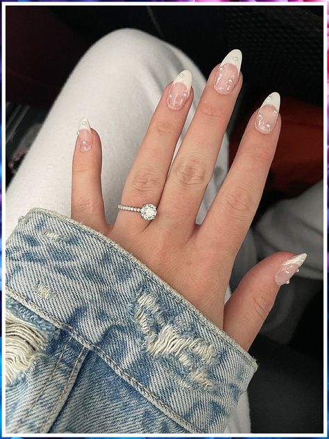 Stay on trend at your winter wedding with these bridesmaid nail designs. Perfect for a touch of elegance. Classy French Tip Nails With Gems, White Tip With Pearl Nails, Wedding Nails French Tip Floral, French Tips Nails With Pearls, Sparkly Pearl Nails, Mini Pearl Nails, Bridal Nails With Rhinestones, Pearl And Gem Nails, Manicure With Pearls