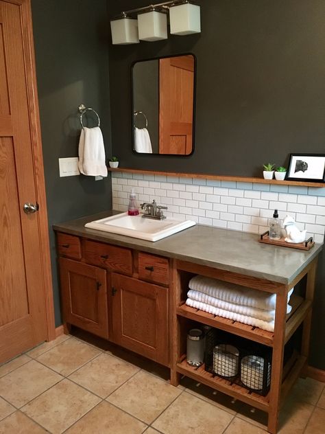 Concrete countertops in the bathroom. Used ardex feather finish over a cheap laminate countertop. A standard 36” Bathroom vanity was extended with open shelves. Redo Countertops, Ardex Feather Finish, Bathroom Vanity Redo, Vanity Redo, Concrete Countertops Bathroom, Laminate Countertop, Kitchen Countertops Laminate, Countertops Concrete, Standard Bathroom