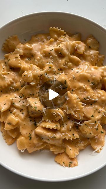 2.4M views · 476K likes | Angela Miley on Instagram: "FarFALLIN for this pasta 🍝 Cheesy Buffalo Chicken with Farfalle aka Bowtie Pasta 😋 RECIPE ⬇️ 

1. Cook 1/2 lb pasta in salted water until al dente.
2. Add olive oil to a pan and 2 chicken breasts cut into bite sized pieces. Season your chicken. 
3. When the chicken is cooked, remove from the pan (optional: mix chicken with Buffalo sauce) then add 3 tbsp of butter.
4. Add 3 cloves minced garlic and 1/2 a diced onion. Cook for a few minutes. 
5. Add 1.5 cups heavy cream. When simmering, lower the heat. Season your sauce. 
6. Add 1/4 cup Asiago, 1/2 cup cheddar and 1/2 cup mozzarella.
7. Add pasta water & mix until creamy. Add 1/2 cup Buffalo sauce. 
8. Add your cooked pasta & chicken to your sauce. Enjoy! #thesecarbsdontcount" Chicken With Buffalo Sauce, Farfalle Pasta Recipes, Cheesy Buffalo Chicken, Bow Tie Pasta Recipe, Pieces Season, Buffalo Chicken Pasta, Farfalle Pasta, Pasta Chicken, Cooked Pasta