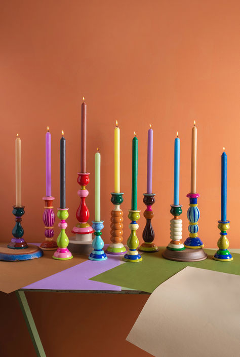 Our collection of bright tones candle holders have been beautifully hand painted in a carnival of vibrant colours. Wood has been expertly carved into wonderful curvy, fluid shapes create effortlessly elegant candle holders fit for any table and any occasion. Pair designs, mix and match, grouped or individual, these candle holders are sure to add a little joy to your décor. Painted Wooden Candle Holders, Clay Candle Holders Diy, Burnt Orange Living Room, Ian Snow, Diy Candle Sticks, Fluid Shapes, Elegant Candle Holders, Elegant Candle, Vintage Bohemian Style