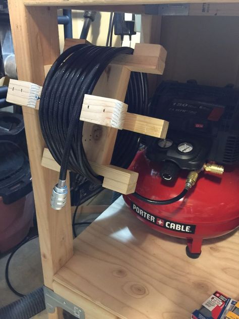 Air Hose Storage Ideas, Hose Reel Ideas Diy, Air Hose Reel Diy, Vacuum Cleaner Hose Holder, Air Hose Reel Mounting Ideas, Diy Hose Reel, Diy Air Hose Reel, Compressor Hose Reel Diy, Diy Air Compressor