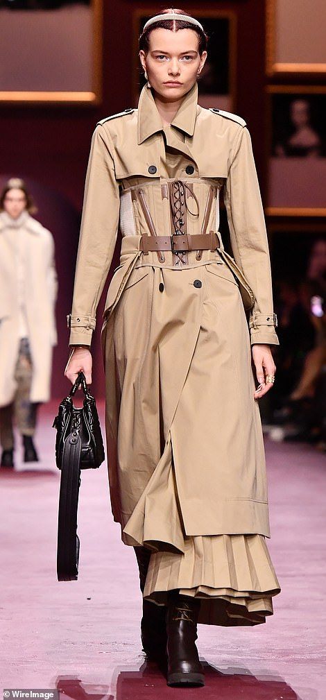 Hot to trot: Another model rocked a trench coat down the catwalk Trench Outfit, Lingerie As Outerwear, Fashion Promotion, Cool Coats, Trench Coat Dress, Trench Coat Style, Coat Women Fashion, Winter Trench Coat, Pregnancy Looks