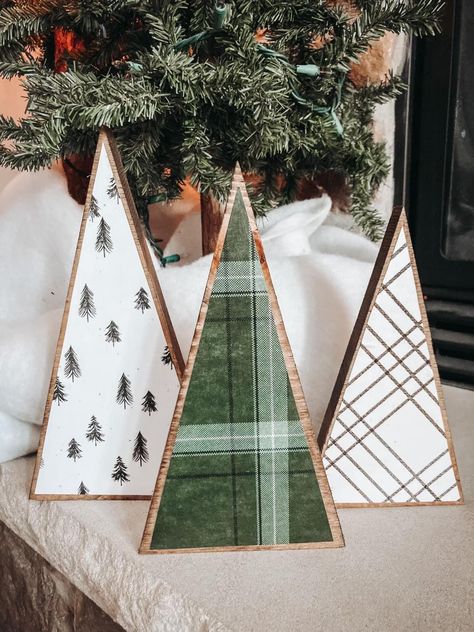 farmhouse style wooden trees. ahhh. they are so cute!❤️ these will be the perfect addition to mantle, wooden tray or your holiday decor. they also make the greatest gift. set includes 3 trees! (10", 9",  8")🌲 made in a smoke/pet free environment. they simple are the perfect decor. these are handmade so imperfections are always possible. Wooden Christmas Trees Green, Decorating Wood Christmas Trees, Wooden Tray Christmas Decor, Wooden Tree Decorations Diy, Cute Wood Crafts, Christmas Trees Wooden, Small Wooden Christmas Crafts, Homemade Wooden Christmas Gifts, Wood Diy Christmas Decor