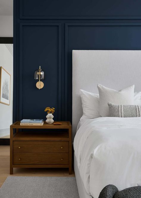 Step inside this Chicago home tour with a bright and inviting makeover Blue Accent Wall, Wall Behind Bed, Navy Accent Walls, Bed Panel, Sleek Fireplace, Beautiful Bed Designs, Navy Bedrooms, Navy Blue Bedrooms, Blue Accent Walls