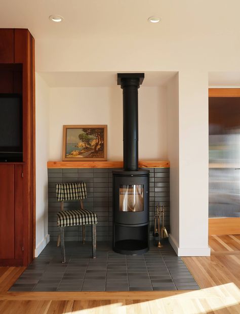 Modern Wood Stove, Midcentury Modern Fireplace, Corner Wood Stove, Wood Stove Surround, Modern Treehouse, Beautiful Fireplaces, Alaska Cabin, Wood Burning Stoves Living Room, Modern Wood Burning Stoves