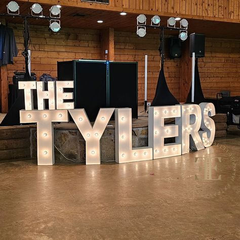 Light Up Your Love Story with EXTRAVAGANZA! ✨ Make your wedding unforgettable with giant marquee letters spelling out your new last name, just like The Tylers! These beauties aren't just for photos - they create a stunning focal point that adds a touch of magic to your entire celebration. Ready to personalize your event with marquee magic? DM us today for a quote and let's make your dream wedding a reality! #DFWweddings #marqueeletters #weddingdecor #extravaganzadfw #theknot #weddingwire #b... Giant Marquee Letters, Engagement Marquee Letters, Mr And Mrs Marquee Letters Diy, Led Marquee Letters, Marquee Letter Lights, Love Sign Wedding Lights Marquee Letters, 2026 Wedding, Dj Stage, Marquee Sign