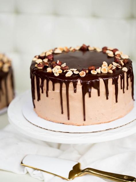 Chocolate Hazelnut Cakecountryliving Raffaello Cake Recipe, European Cakes, Ferrero Rocher Cake, Chocolate Hazelnut Cake, Fall Cake Recipes, Nursing Cake, Russian Cakes, Inside Cake, Cake Liner