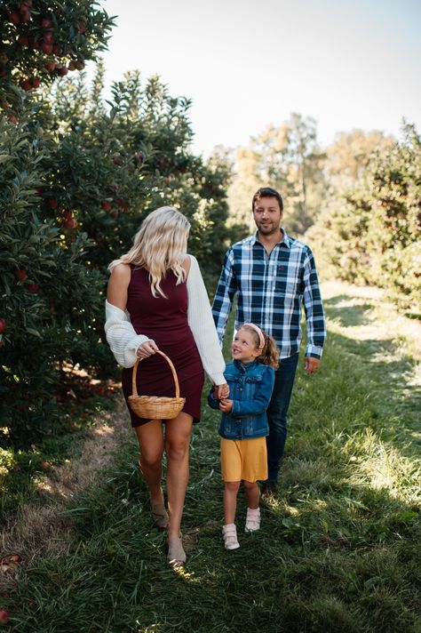 looking for a fun fall family photo location? check out your local apple orchard! Orchard Photoshoot Family, Apple Orchard Photoshoot Family, Apple Orchard Family Pictures, Apple Orchard Photoshoot, Apple Orchard Photography, Apple Orchard Pictures, Orchard Photoshoot, Orchard Photography, 2024 Family