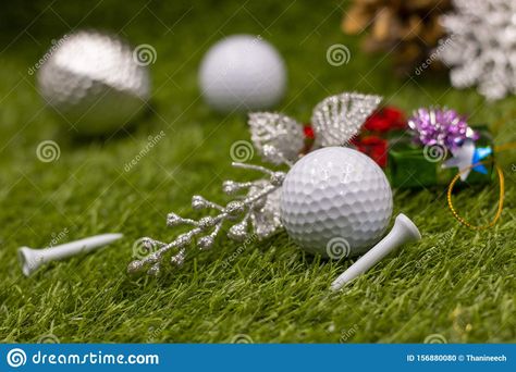 Photo about Merry Christmas to golfer with golf ball and tee are on green grass with Christmas ornament. Image of card, design, holiday - 156880080 Golf Photography, Frog Statues, Golf Ball Markers, Ball Design, Golf Tees, Ball Markers, Golf Tips, Green Grass, Golf Equipment