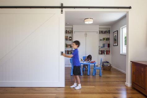 Kids' study area and playroom delineated from the rest of the home using sliding barn door | 27 Creative Kids’ Rooms with Space-Savvy Sliding Barn Doors | Decoist Playroom French Doors, Kids Study Area, Creative Kids Rooms, Study Area, Kids Study, Sliding Barn Doors, Study Areas, Barn Doors Sliding, Sliding Barn Door