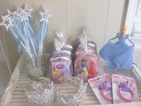 Cinderella Favor Table with Wands, Tiaras, Goody Bags, and Teething Rings for the Tiny Princesses. Cinderella Birthday Party Gift Bags, Birthday Party Gift Bags, Goodie Bag Ideas, Birthday Extravaganza, Favor Table, Cinderella Birthday Party, Princess Wands, Cinderella Party, Cinderella Birthday