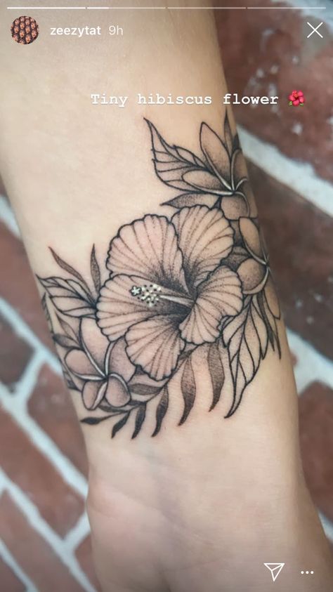 Hibiscus flower #hawaiiantattoos #flowertattoos #tropicaltattoo  Artist: @zeezytat Braclet Tattoo, Feminine Arm Tattoos, Wheat Tattoo, Tropical Flower Tattoos, Hawaii Tattoo, Hibiscus Flower Tattoos, Tropical Tattoo, Wrist Bracelet Tattoo, Bang Hair