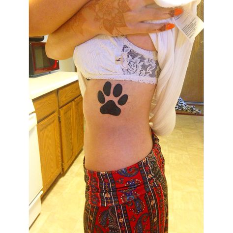 Dogs paw print on ribs. Dog Rib Tattoo, Paw Print Hip Tattoo, Unique Paw Print Tattoo, Paw Print Tattoo On Ribs, Actual Paw Print Tattoo, Angel Wing Drawing Tattoo, Tattoos On Ribs, Dogs Paw Print, Dog Outline Tattoo